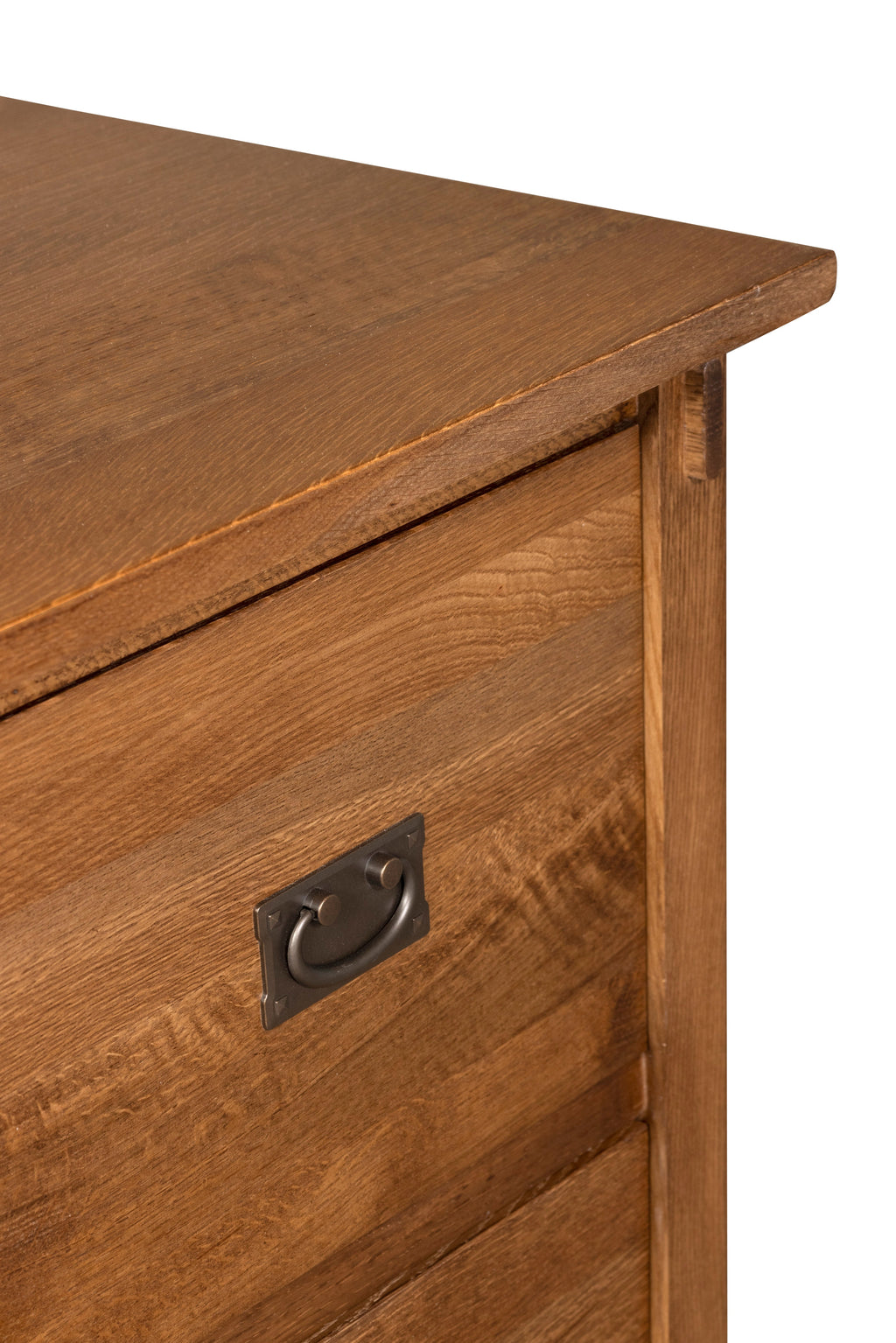 Close-up of top edge and drawer pull on walnut-stain 2-drawer cabinet