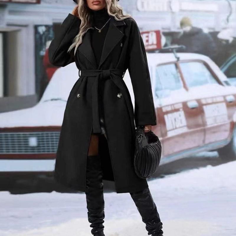 Women’s black long belted double-breasted trench coat with notched lapels