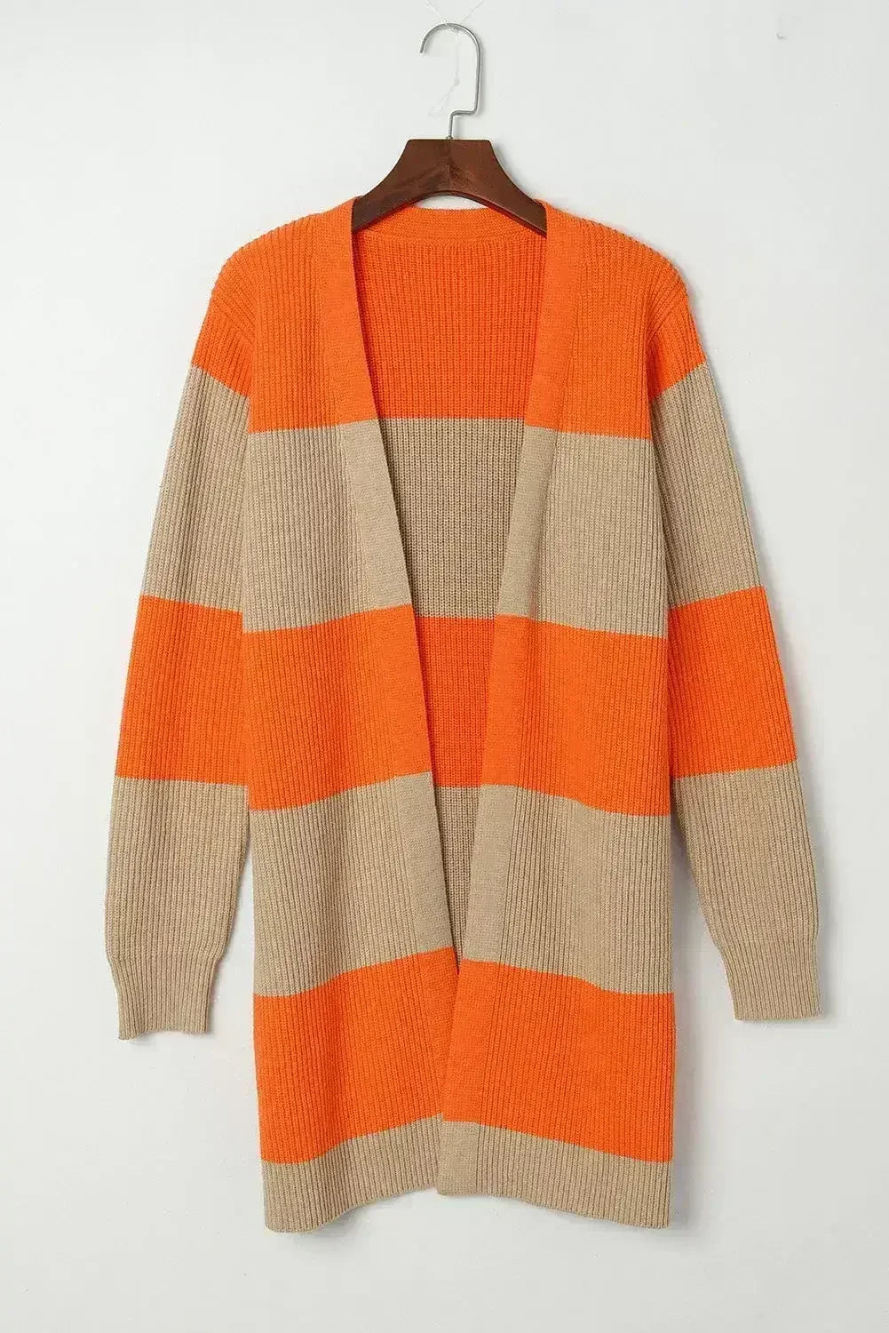 Hanging orange and beige striped ribbed knit cardigan with open front and long sleeves