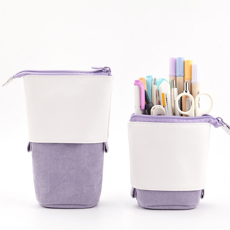 Two purple and white zipper pencil case pen holders with small dangling drawstring tabs