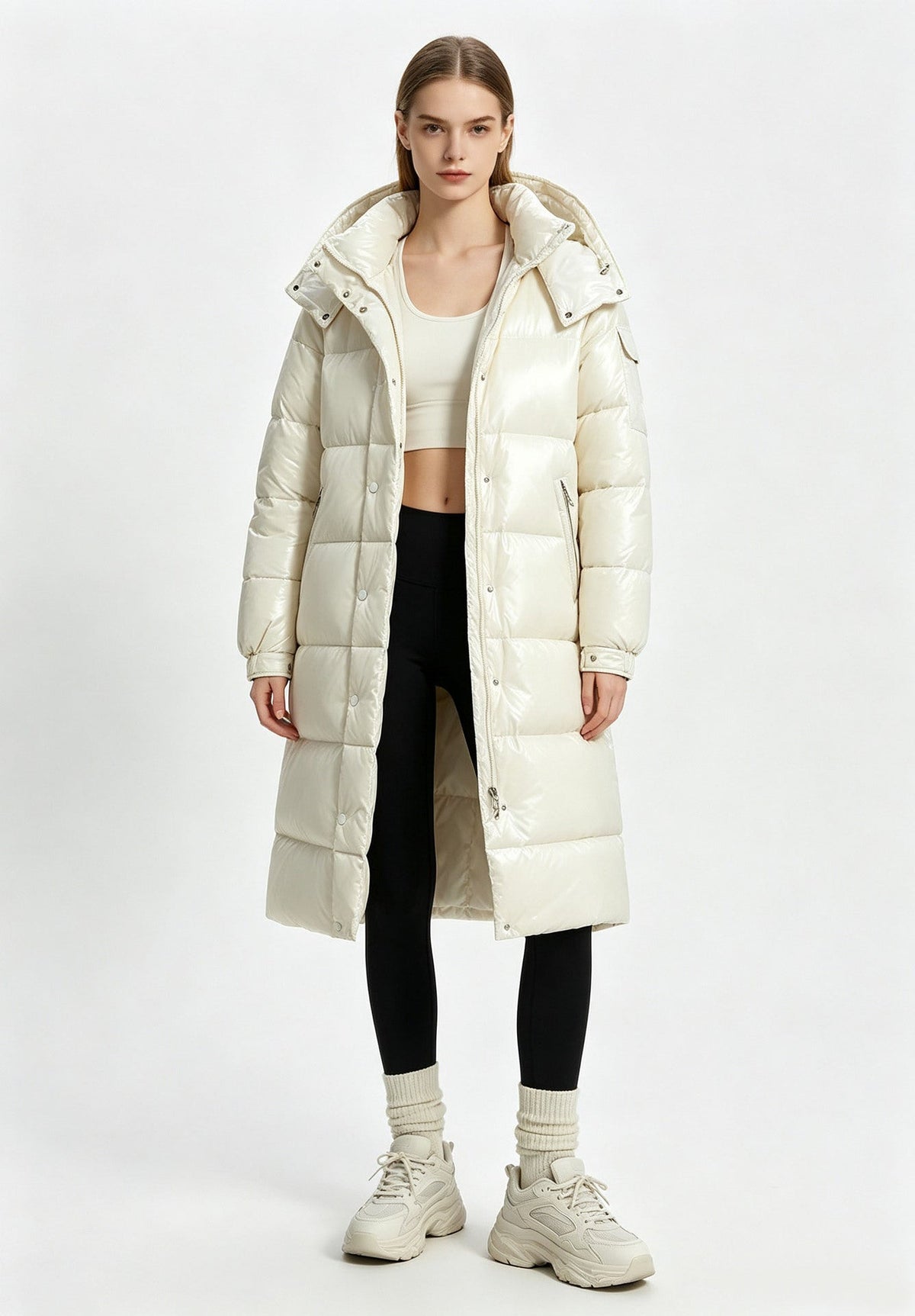 Cream long padded hooded coat with front zipper and quilted puffer panels, over-the-knee