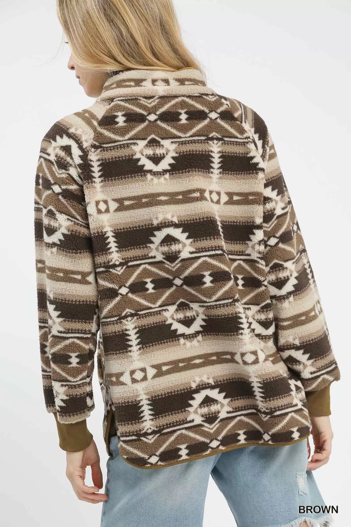 Back view of brown Aztec-print sherpa pullover with high collar and contrast sleeve cuffs
