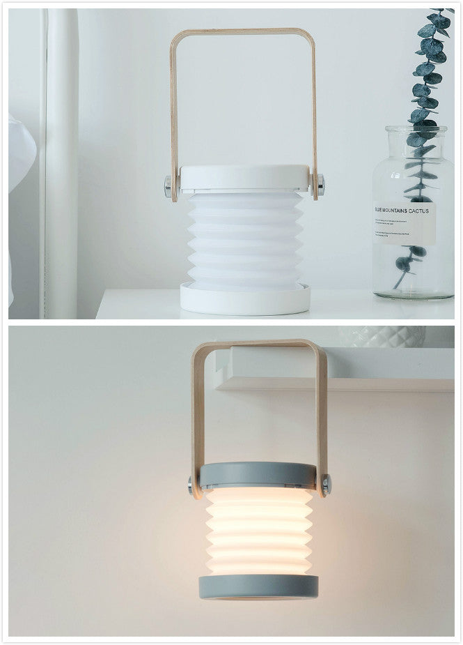 Foldable LED night light lantern, white ribbed body with top handle, USB rechargeable