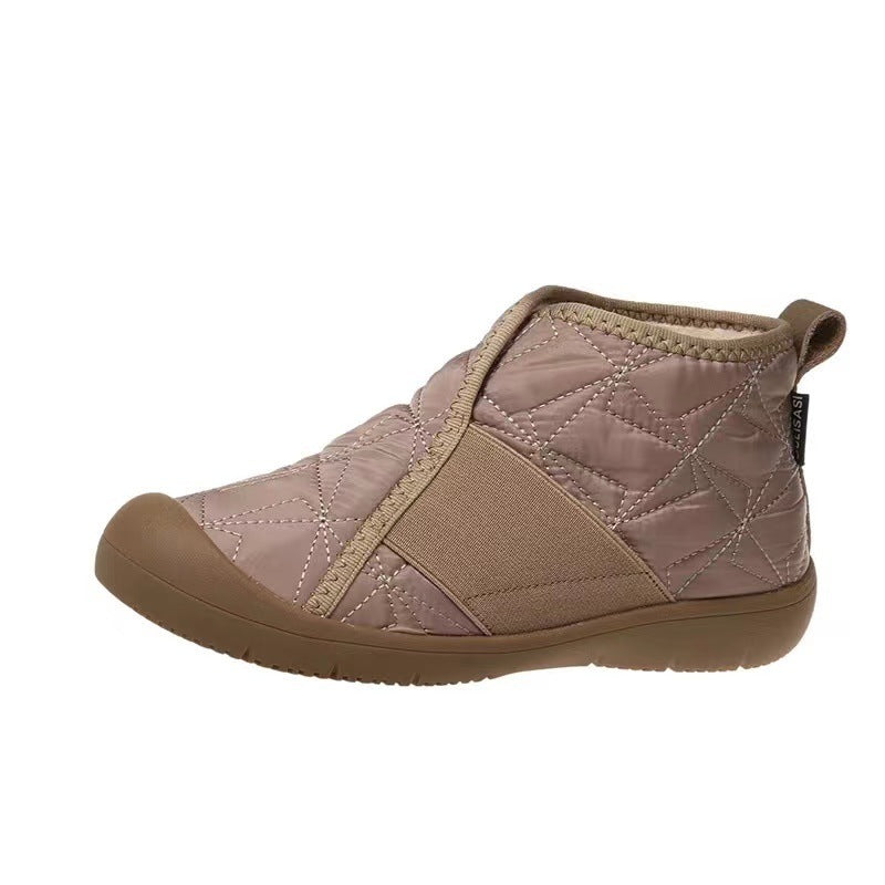 Light beige ankle snow boots with quilted upper, fleece collar, and tan flat sole