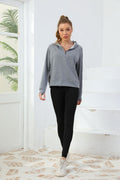 Gray half-zip cotton hoodie sweatshirt with hood and straight hem
