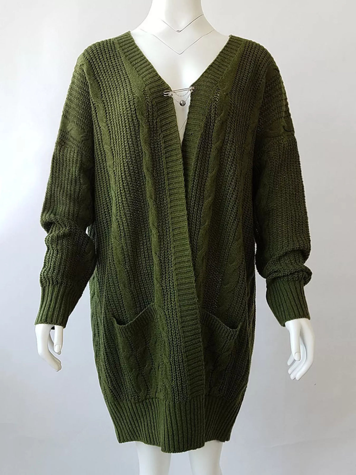 Green chunky knit open-front cardigan with V-neck, button placket, and patch pockets