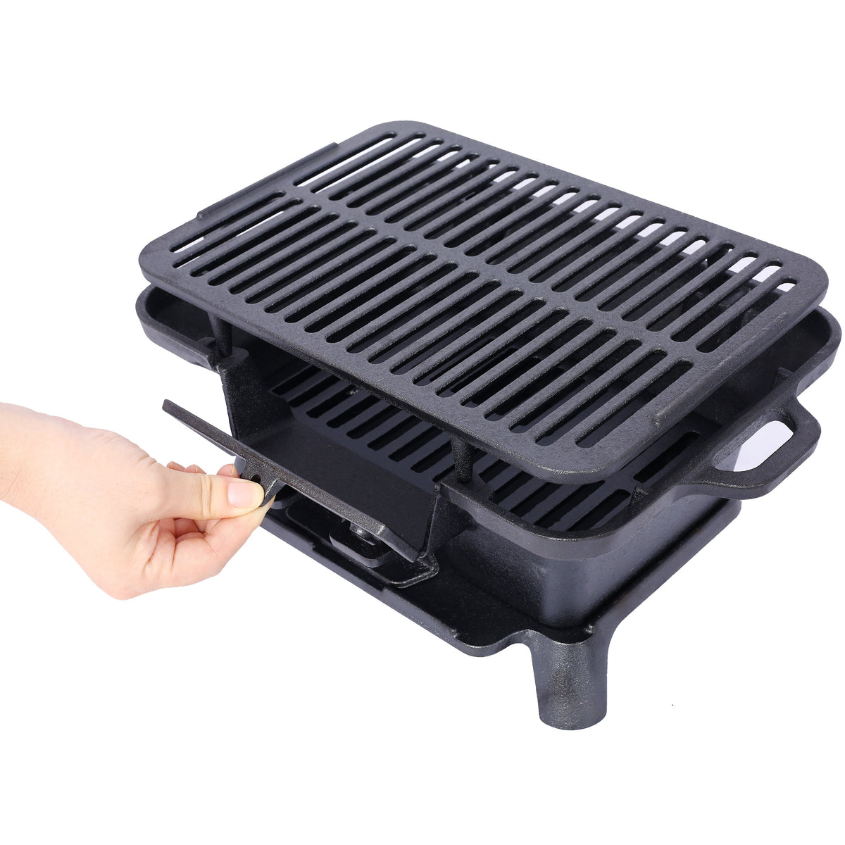 Oval tabletop cast iron grill with slotted grate and lift handle, dark charcoal finish