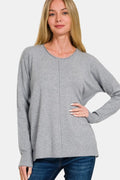 Gray front-seam round-neck sweater with long sleeves, relaxed fit