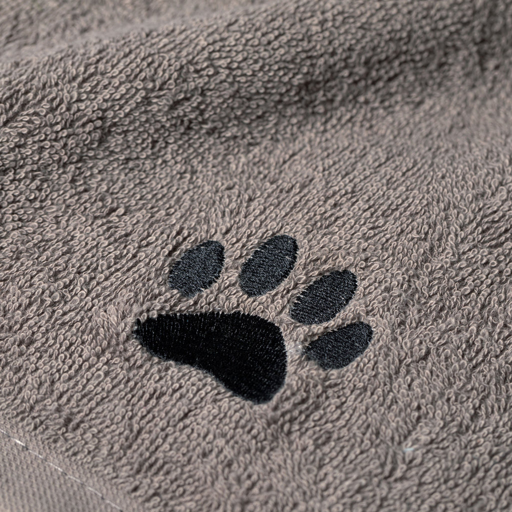Embroidered paw wash cloth detail, gray terry fabric with black paw print