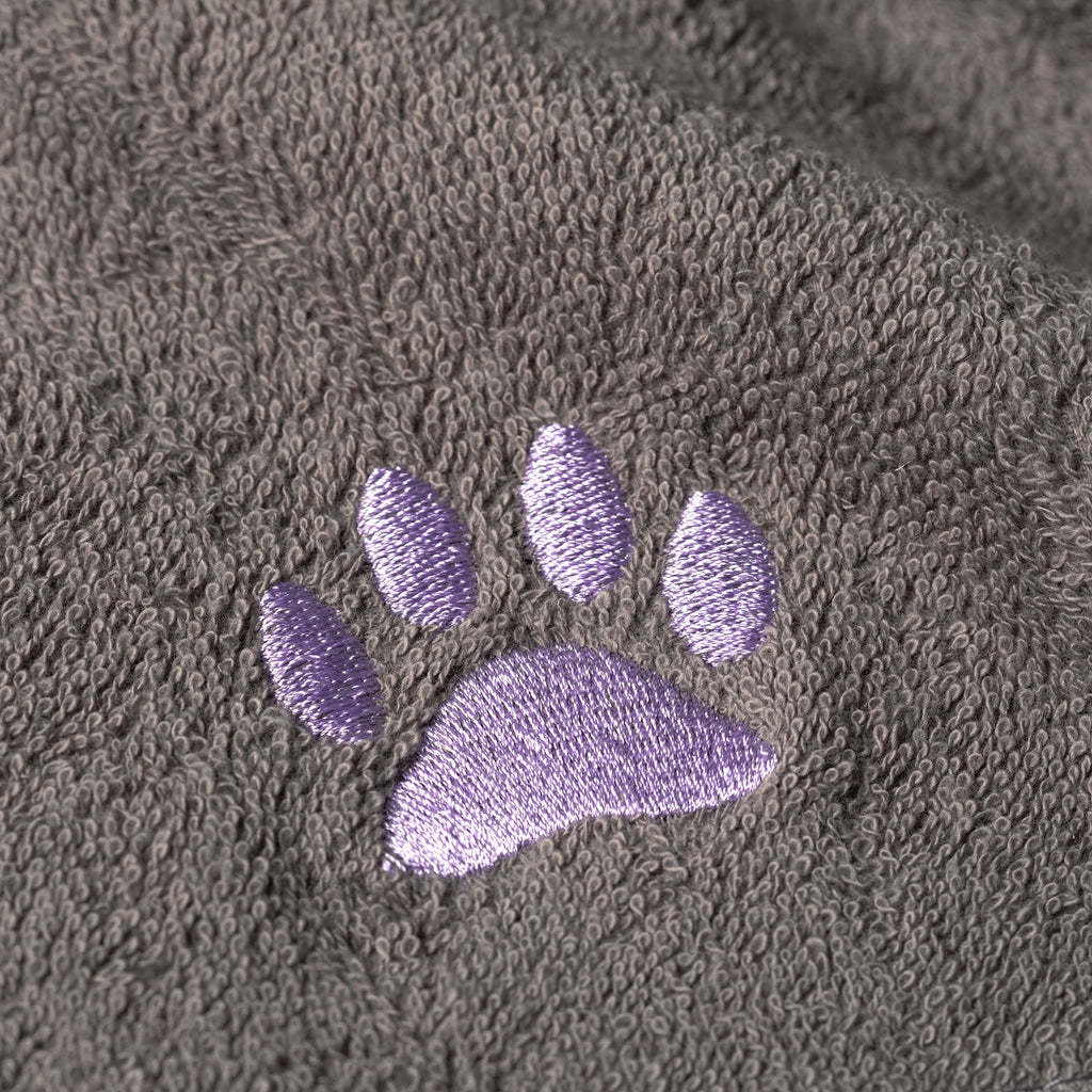 Embroidered paw wash cloth detail, gray terry with purple stitched paw print