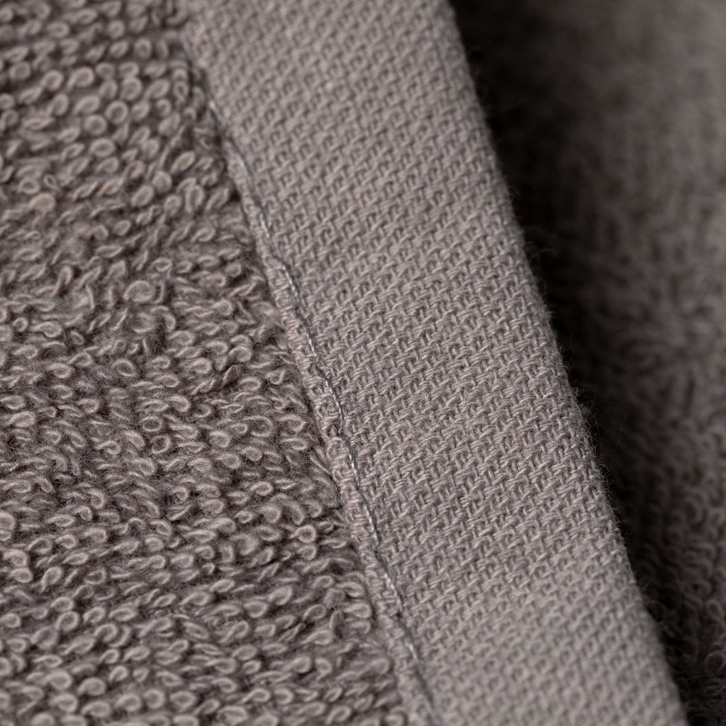 Embroidered paw wash cloth edge detail, gray terry with stitched border