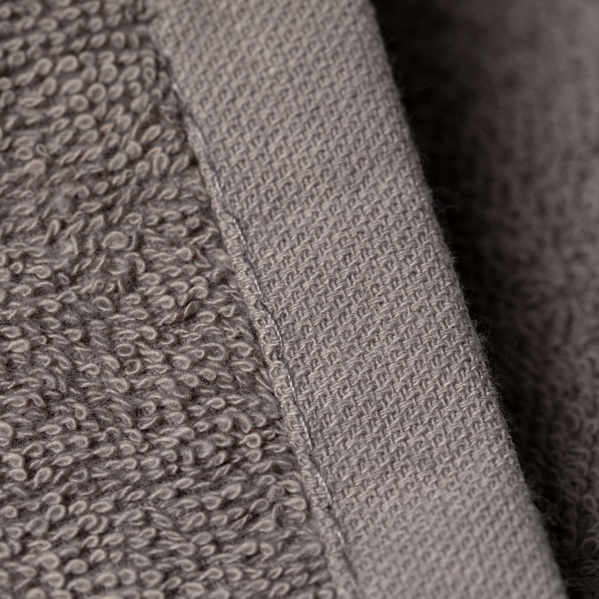 Embroidered paw wash cloth edge detail, gray terry with stitched border