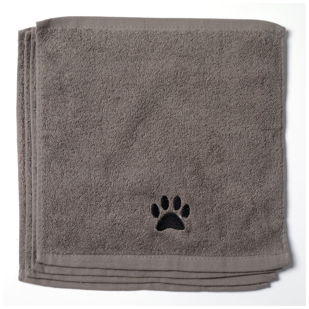 Embroidered paw wash cloth, gray towel stack with black paw logo centered