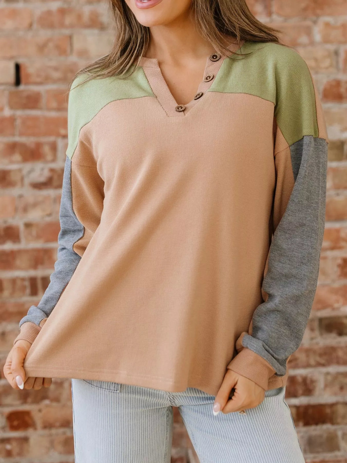 Color block thermal henley top in camel with green yoke and gray long sleeves