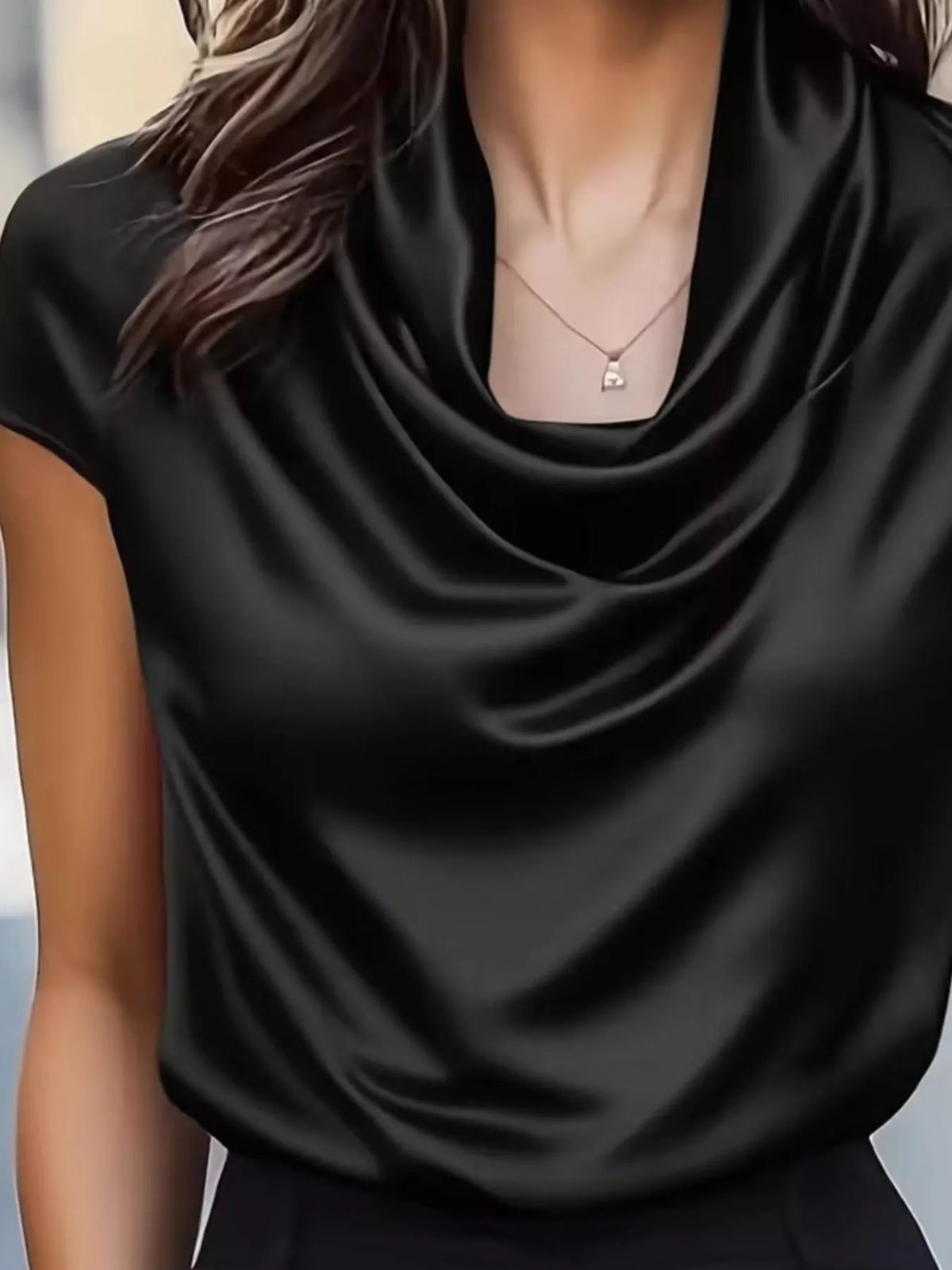 Black satin cowl-neck blouse with smooth cowl neckline and short sleeves