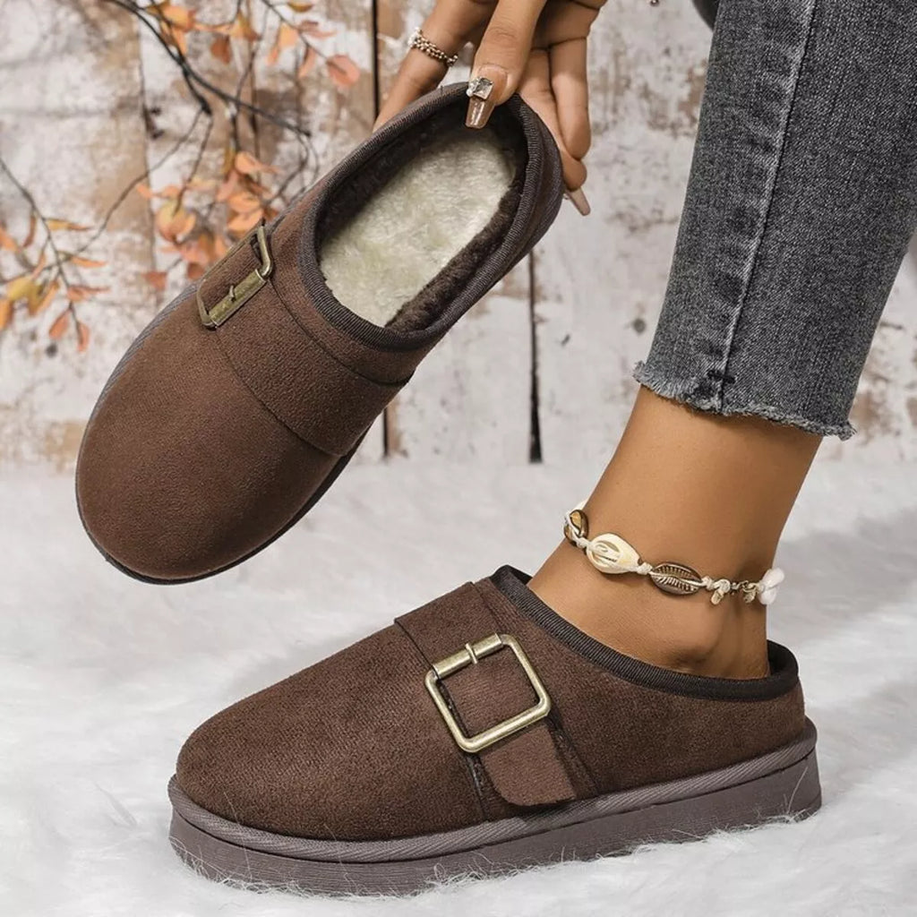 Chocolate-brown plush-lined slippers with gold-tone buckle and rounded toe