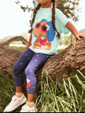 Kids animal graphic tee and purple polka dot leggings set with matching prints