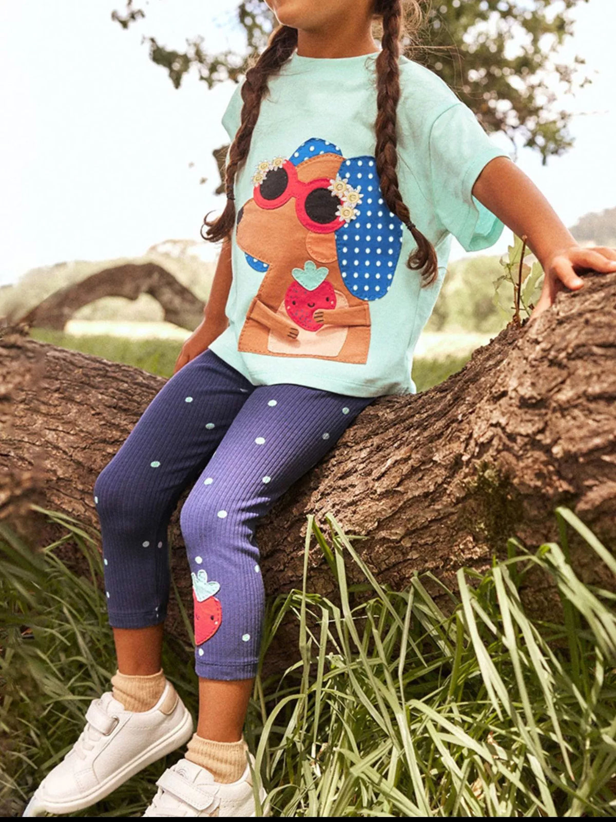 Kids animal graphic tee and purple polka dot leggings set with matching prints