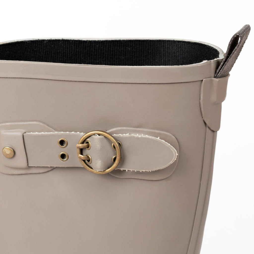 Taupe tall rain boot side buckle with gold-tone rings and buttoned strap detail.