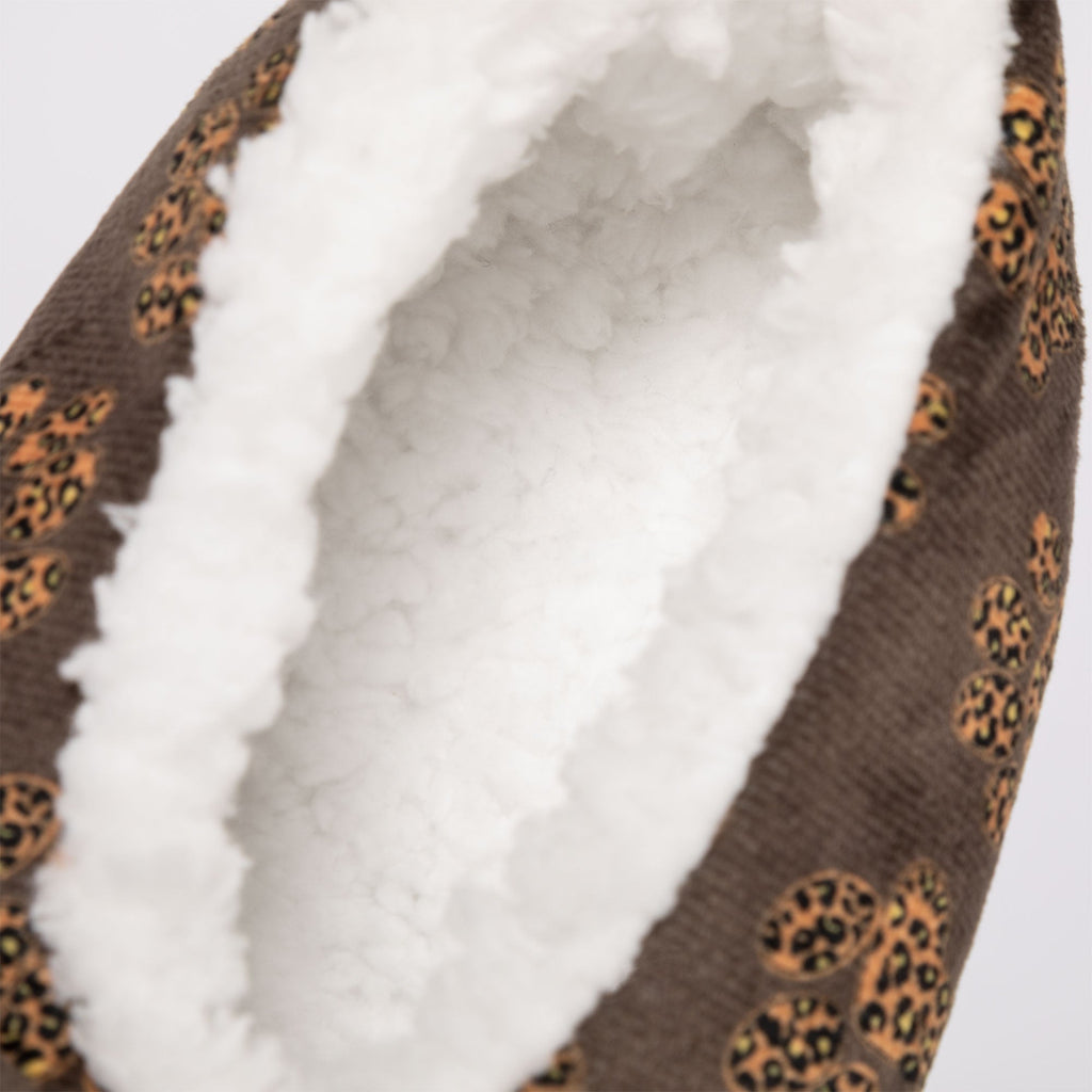 Close-up of leopard paw slipper interior with plush white lining and brown fabric