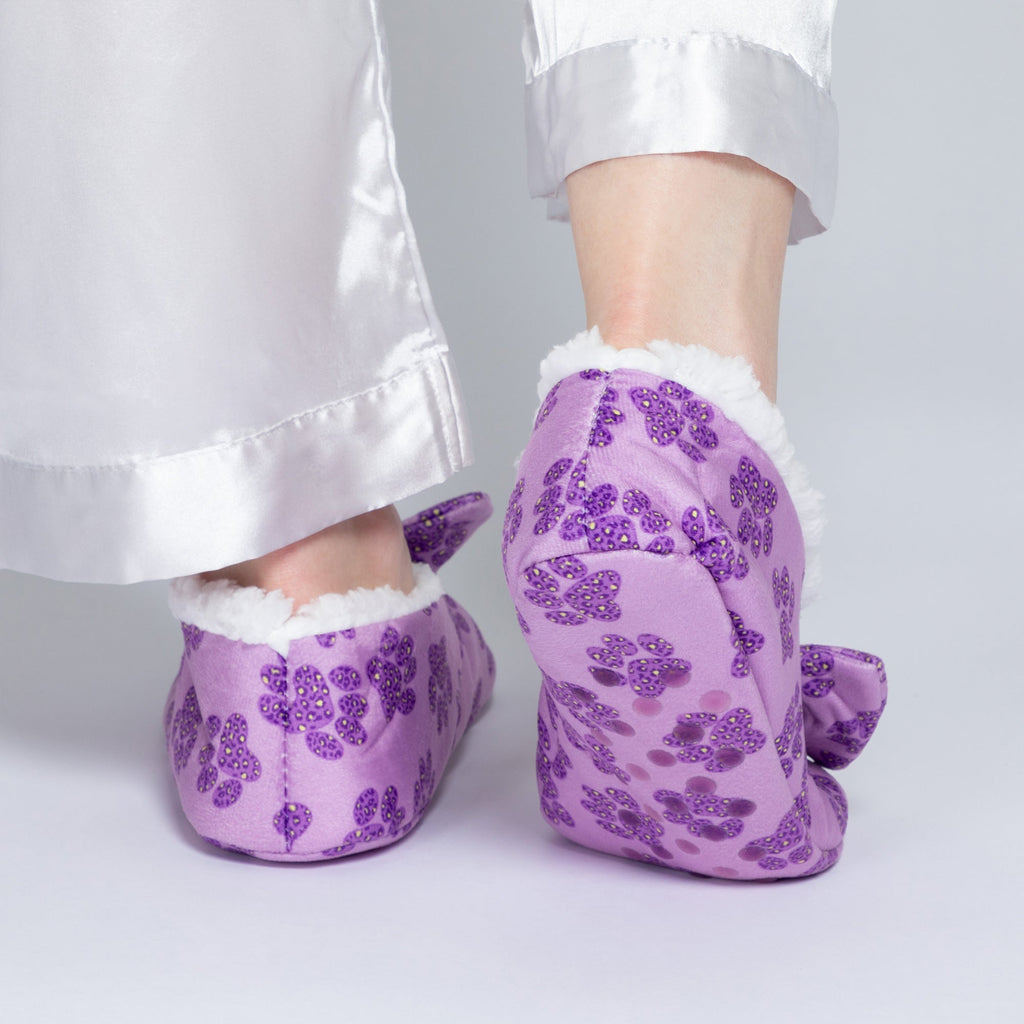 Purple sequin paw slippers with fuzzy white trim, showing heel and sides