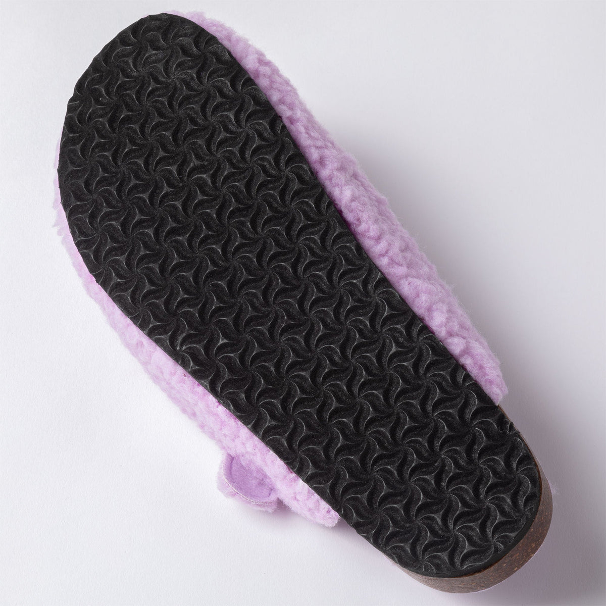 Dark sherpa clog slippers with paw-print appliques and purple plush lining