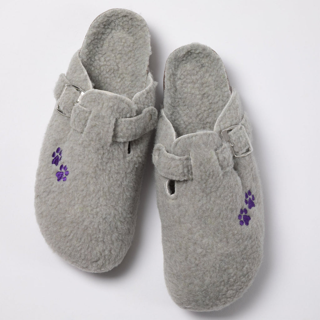 Gray plush sherpa clog slippers with purple paw print patches and buckle straps
