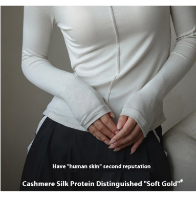 Women’s modal half-turtleneck top close-up with front zip, long sleeves, light gray-white