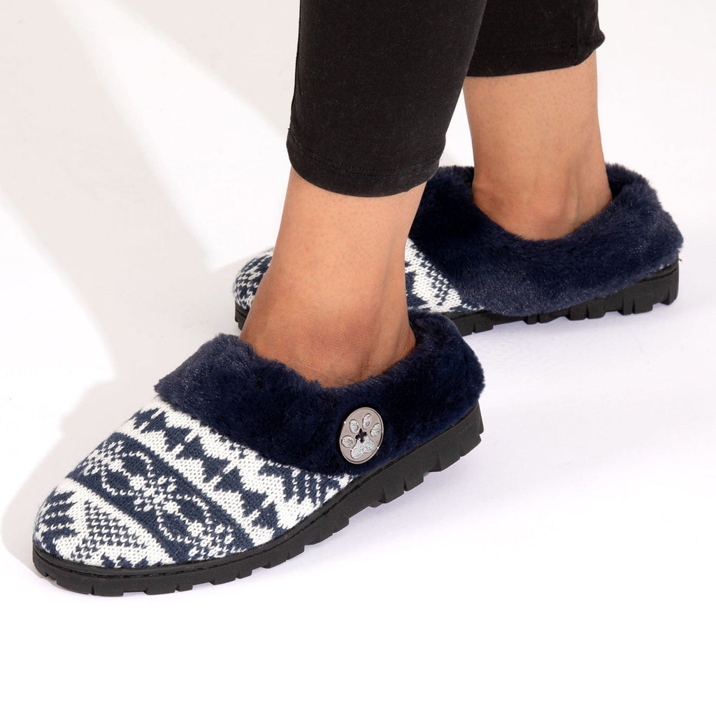 Blue fair isle knit clog slippers with round paw button on dark fuzzy strap