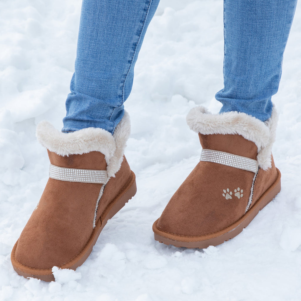 Tan paw-print ankle boots with faux fur cuff and rhinestone strap.