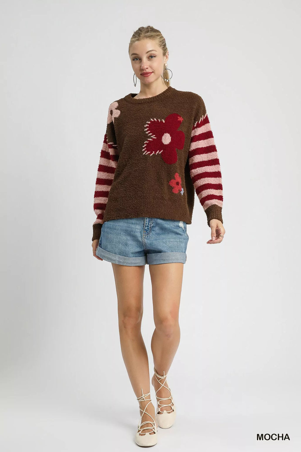 Mocha brown long-sleeve sweater with red flower jacquard and striped sleeves
