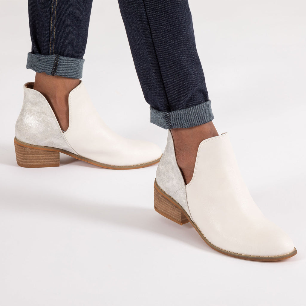 White slip-on ankle boots with low block heel and side elastic gore