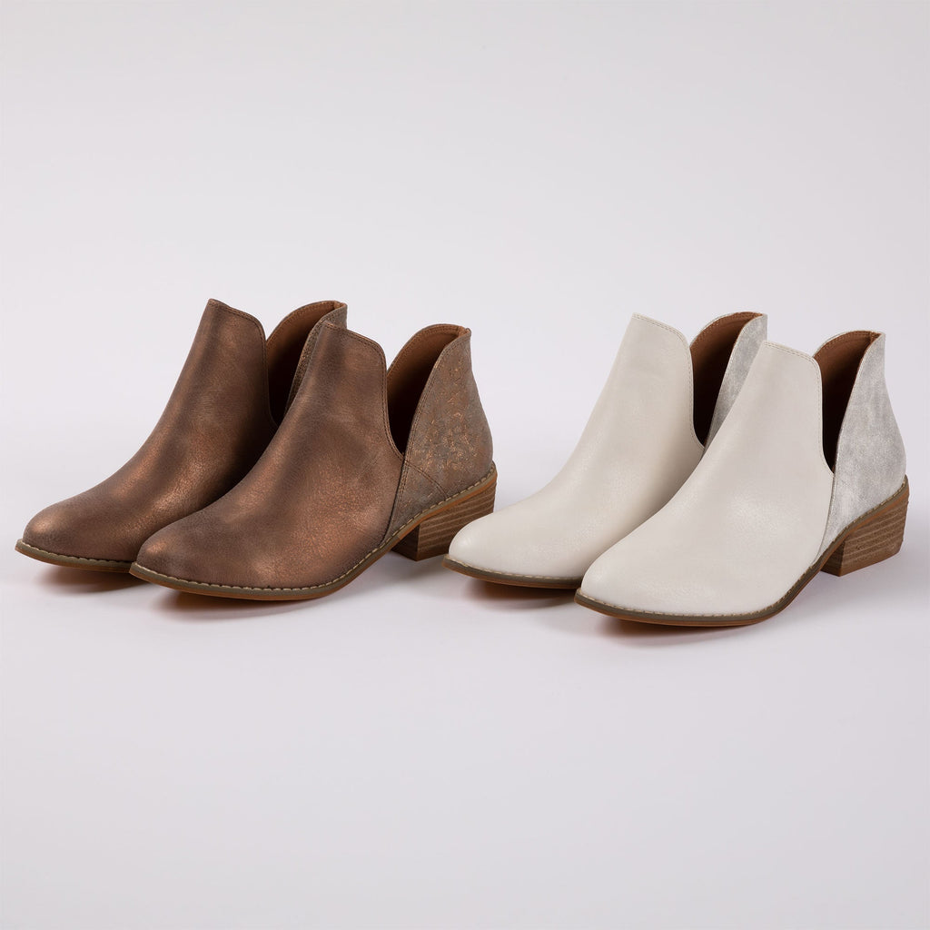 Pair of slip-on ankle boots: white and brown, with low block heels