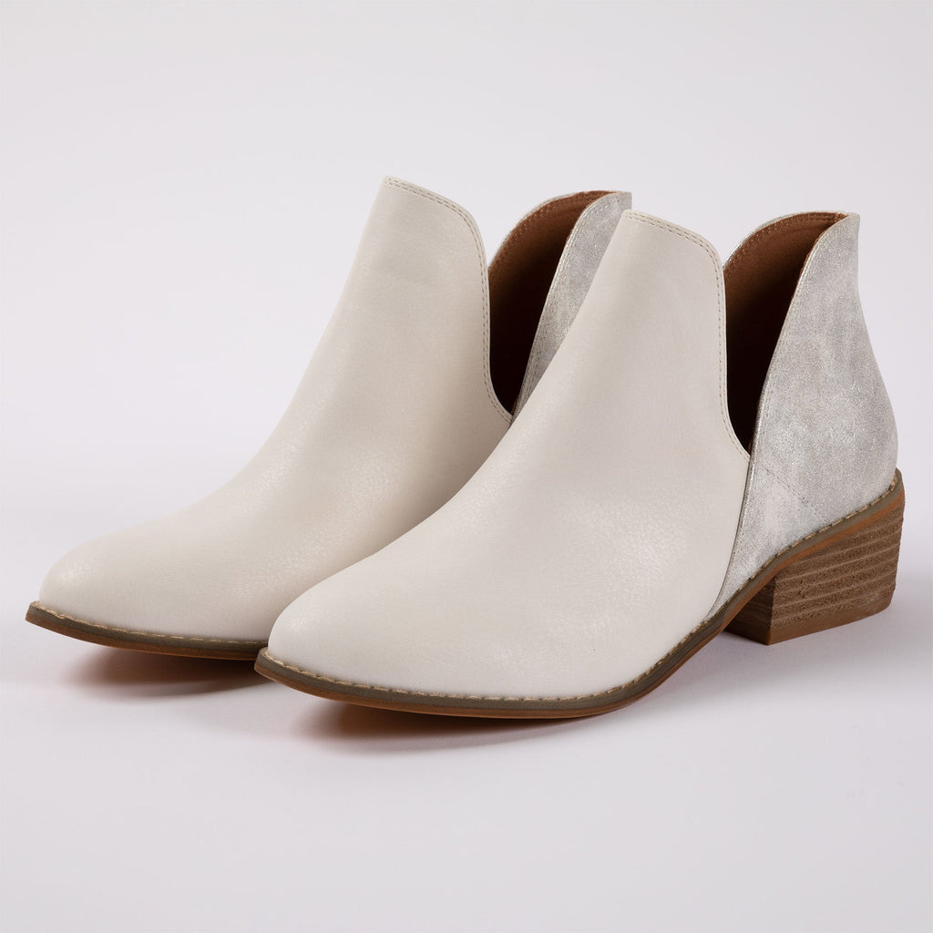 White slip-on ankle boots with side elastic panel and stacked brown heel