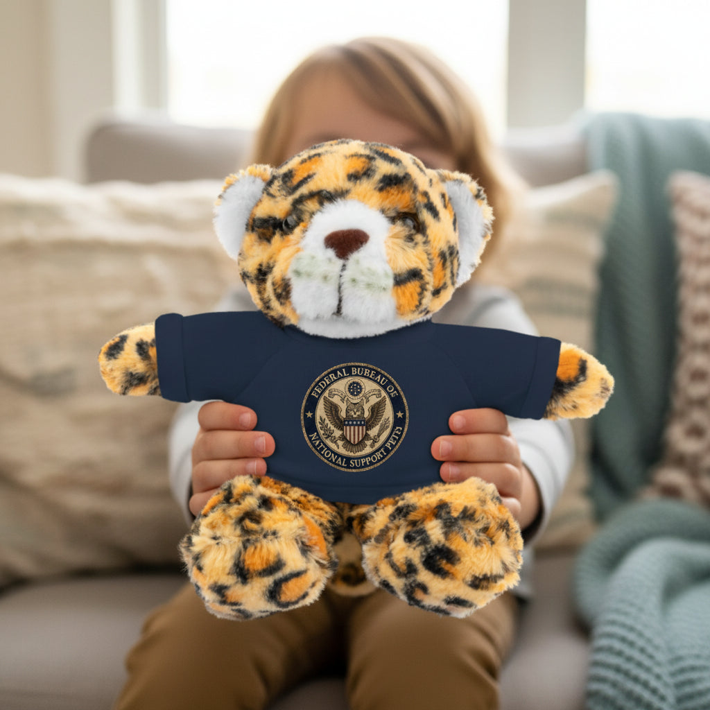 Jaguar plush toy with navy T-shirt and round emblem, soft spotted fur