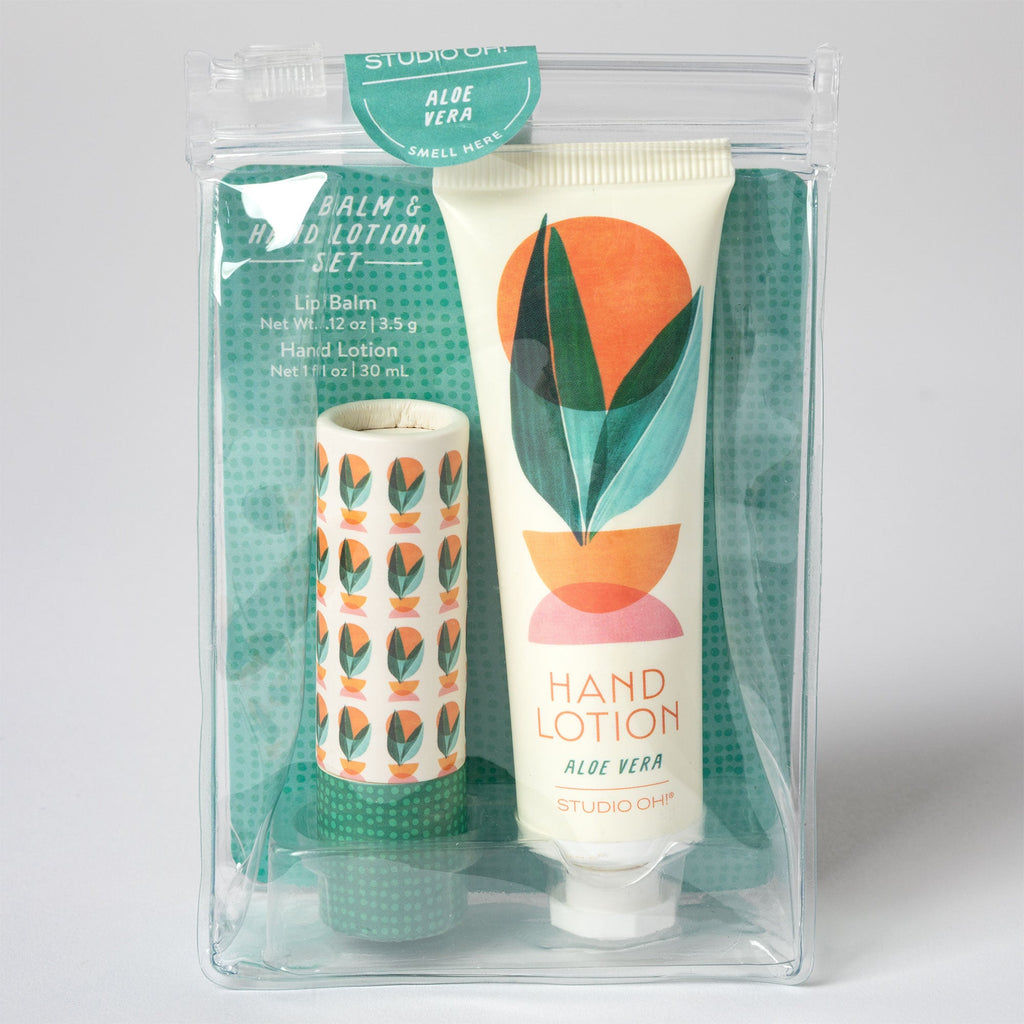 Gift set in clear zip pouch: hand lotion tube and lip balm stick with aloe label
