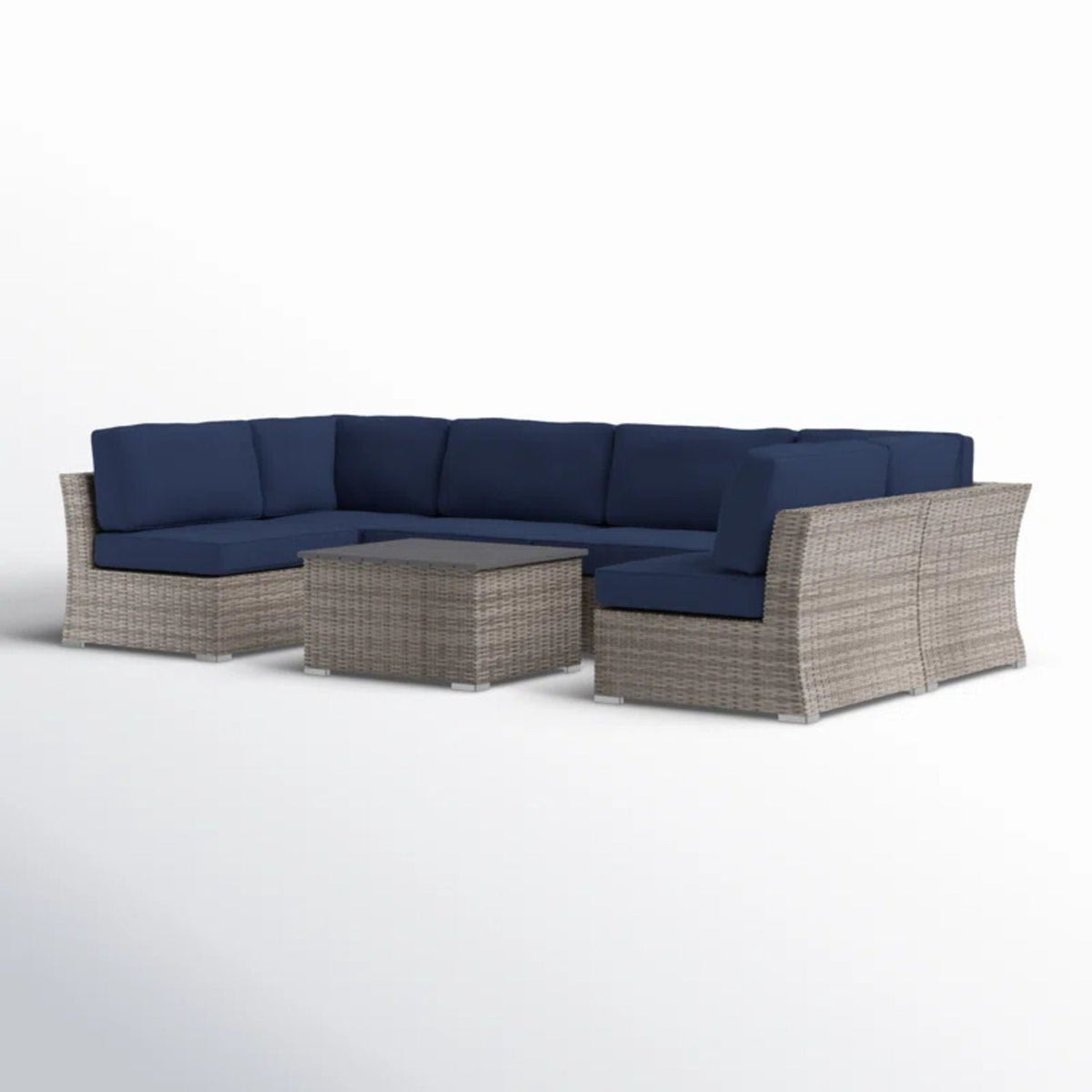 Wicker sectional sofa with blue cushions and square coffee table