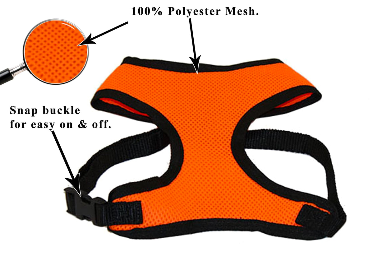 Orange mesh dog harness laid flat with black straps and padded panels