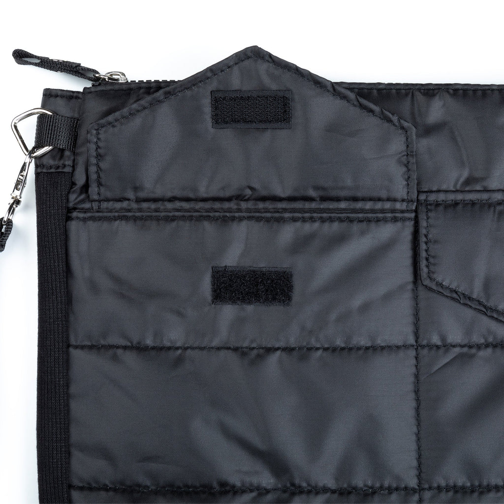Black quilted tablet case close-up of interior panel and fabric label