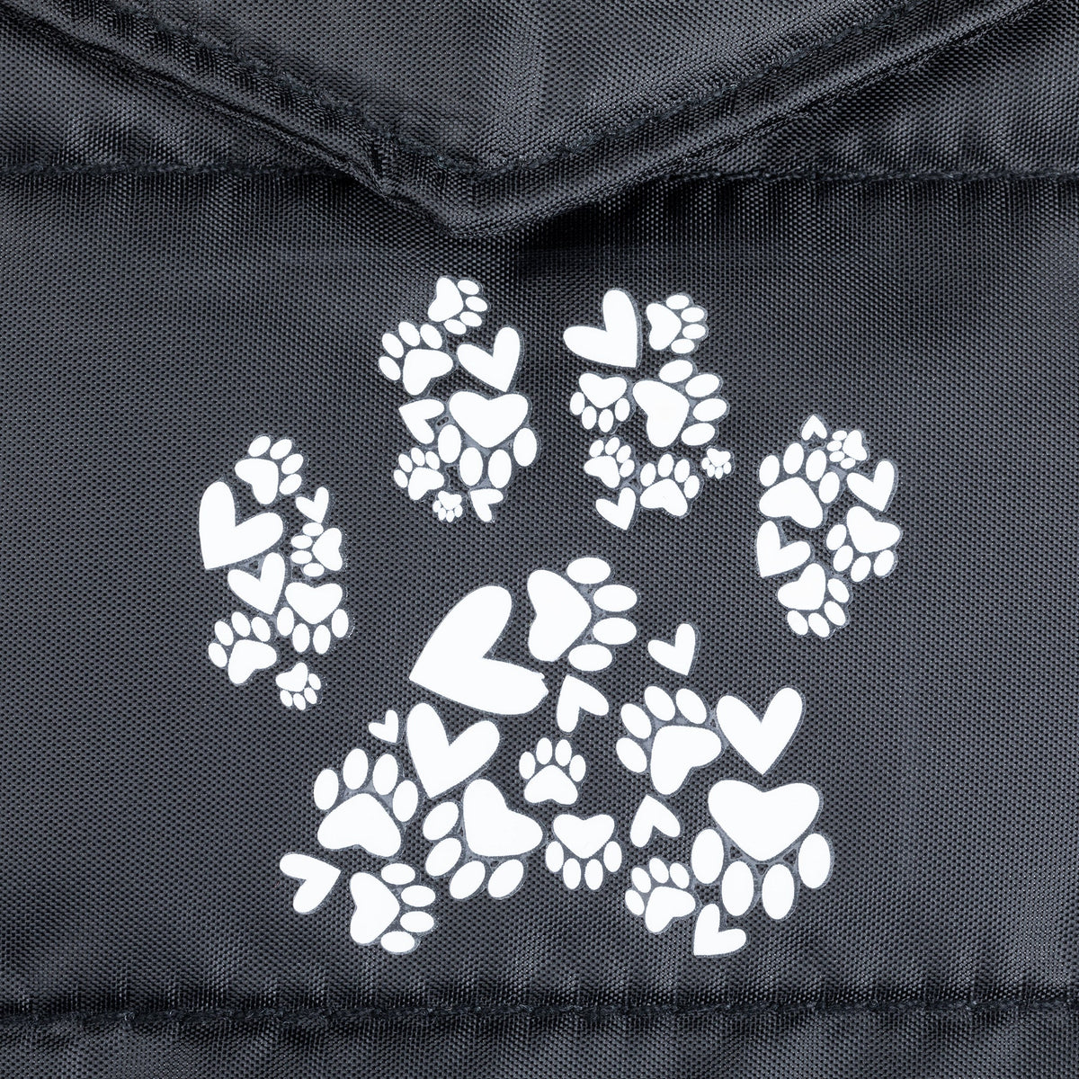 Black fabric panel with white paw prints and heart icons, stitched edge trim