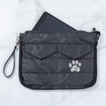 Black quilted tablet carrying case with paw print front applique, zipper closure