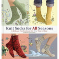 Assorted knit crew socks in green, yellow, red, and white