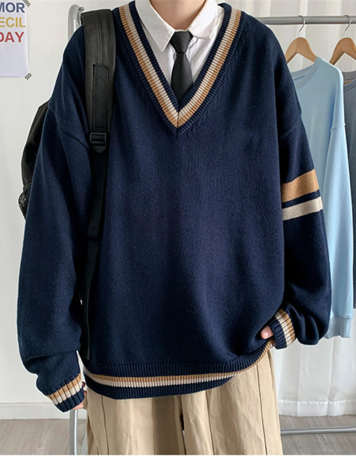 Men's navy V-neck contrast striped long-sleeve sweater with ribbed cuffs and hem
