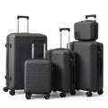 Lightweight 5-piece luggage set with telescoping handles and spinner wheels, dark color
