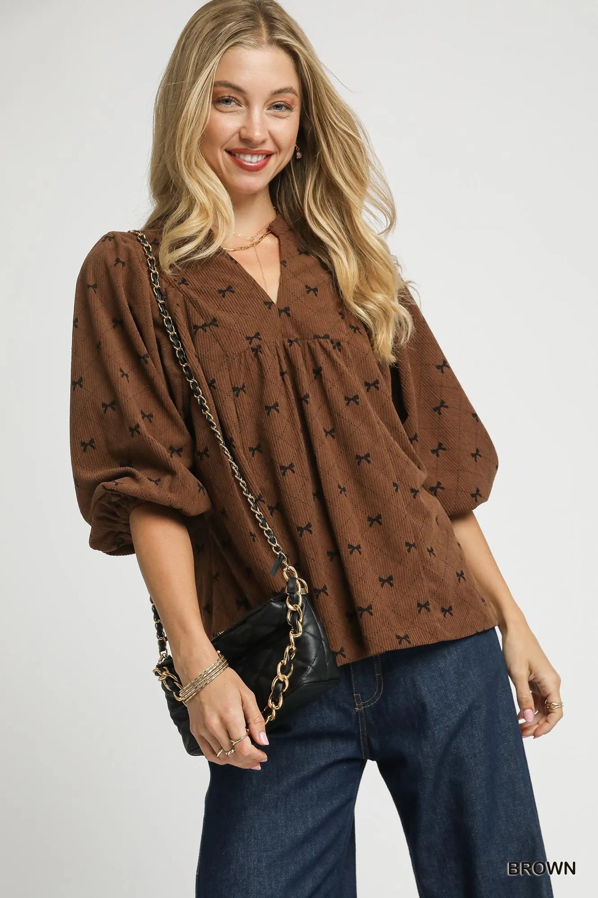 Brown corduroy bow-print blouse with balloon sleeves and V-neck, gathered waist