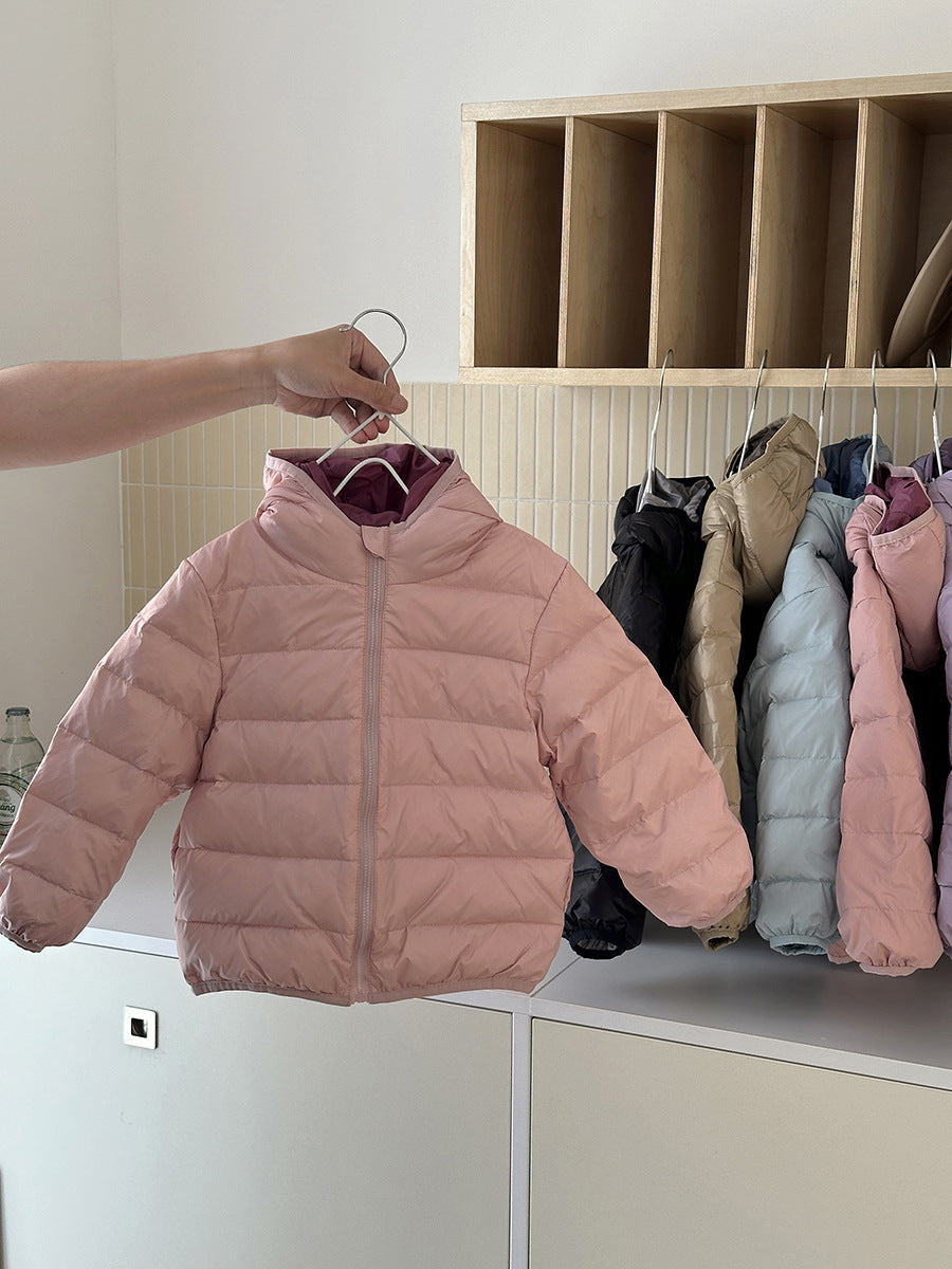 Kids' pink hooded puffer jacket with full zip front and quilted padded body