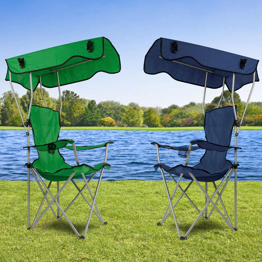 Pair of folding canopy beach chairs in green and navy blue with padded seats