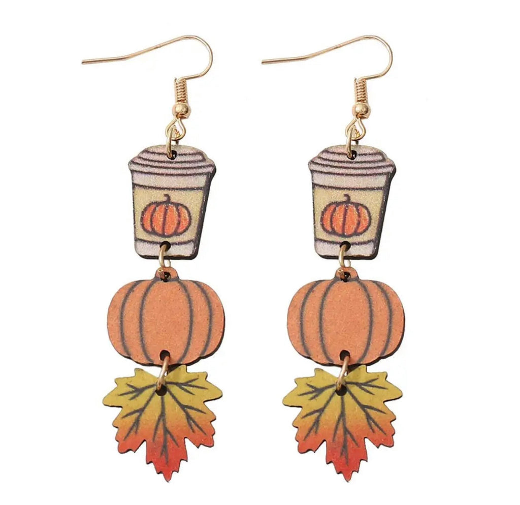 Wood drop earrings showing coffee cup and pumpkin charm with leaf accents