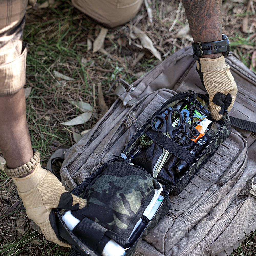 Grey tactical first aid kit pouch with gear and flashlight compartments