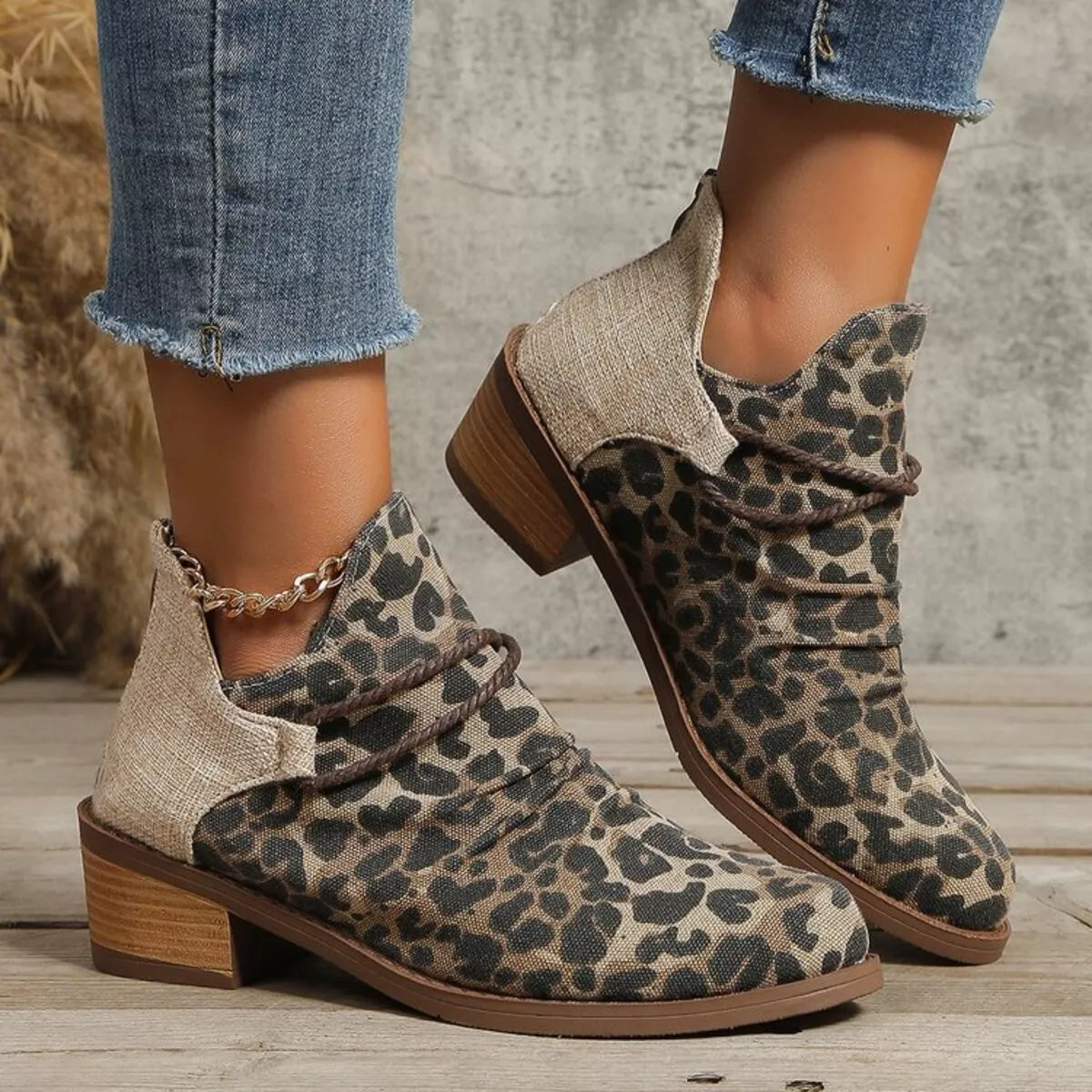Leopard print ankle boots with block heel, beige collar panel, lace-up sides